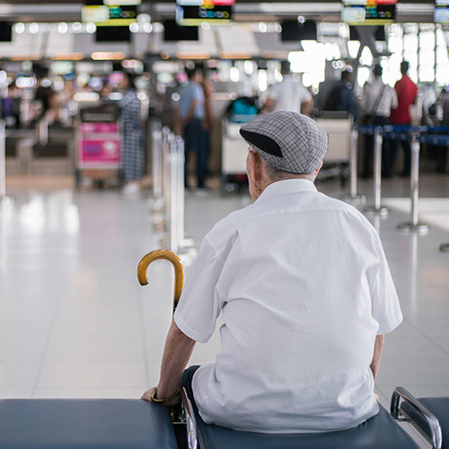 Man sitting on a bench at the airport